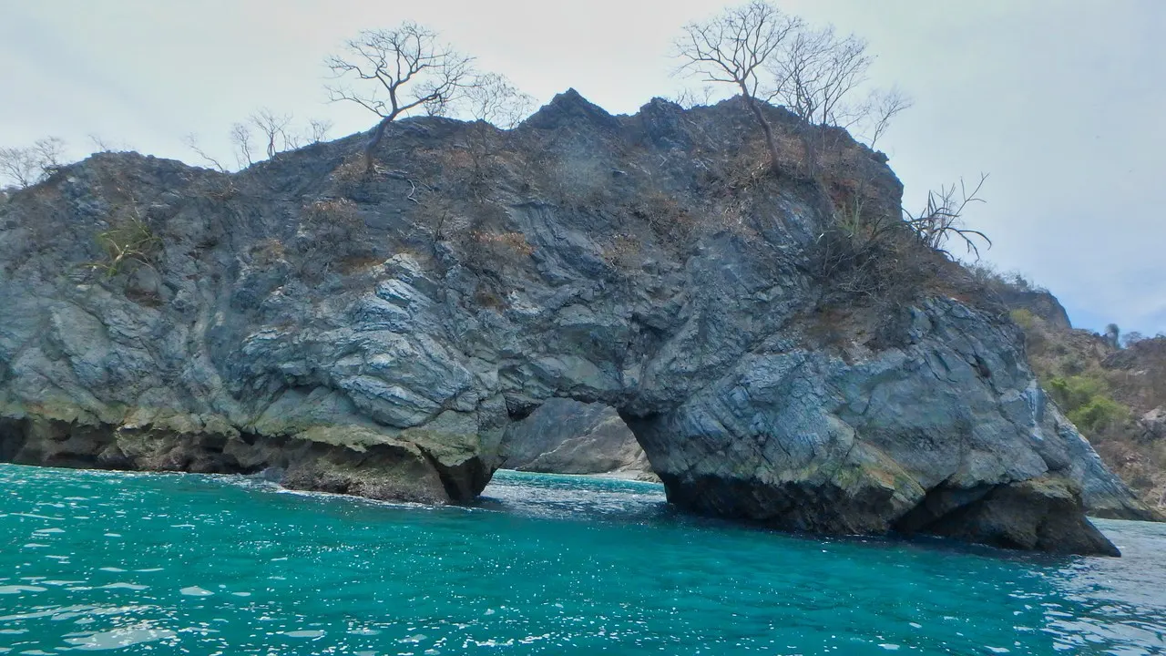 Rock arch on the Pacific coast, Costa Rica